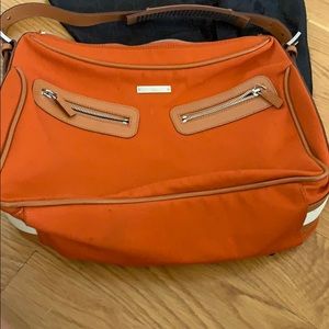 A orange Gucci bag